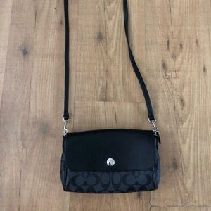 Coach black pocket book